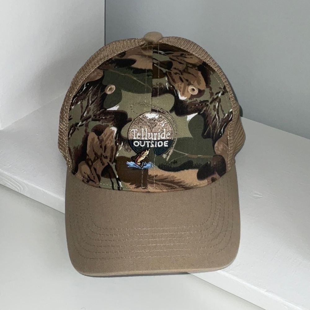 NWOT “Telluride Outside” Camo Baseball Hat w/ natural color brim & mesh back.